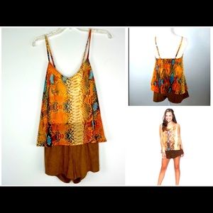 Bundle 3/$40 Anthropologie Judith March Snakeskin Romper with open back.